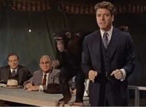 Elmer Gantry and friend lecture on evil-ution.