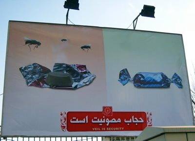 Billboard in Iran reads "Hijab is safety". From whom?